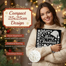 A woman in a cream knit sweater holds a black Christmas-themed compact carrier decorated with white snowflakes, ornaments, and the words 'Merry Christmas.' The image includes promotional text describing the compact's 25x25 cm design, holiday scene adaptation, emotional meaning, and Christmas theme, with a close-up inset of white pearls on the bottom right.