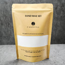 Candittle sand wax set packaging on a gray background