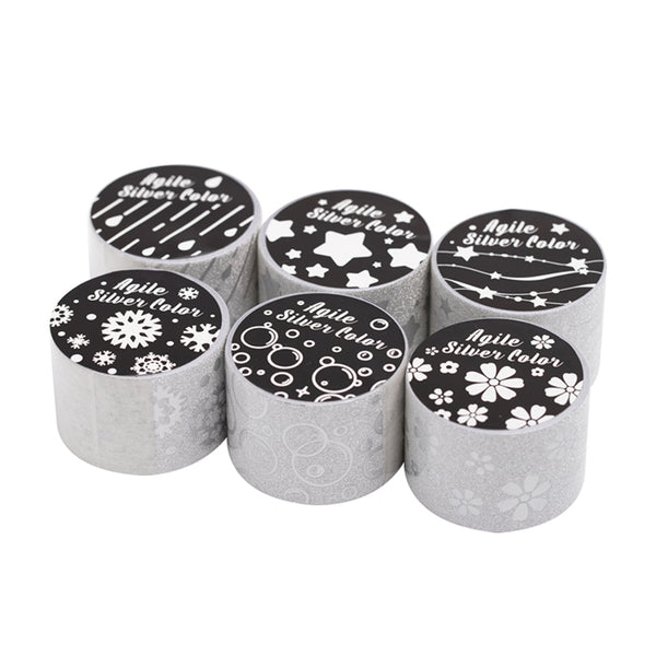 Set of six cylindrical containers with black lids featuring white designs on a white background
