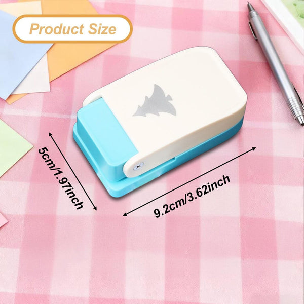 A small white and light blue paper punch tool shown on a pink checkered surface with measurement arrows and text indicating 5 cm by 9.2 cm dimensions.