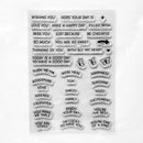 A sheet of clear acrylic or plastic stamps with multiple embossed sentiment phrases and small decorative icons, shown on a plain white background.