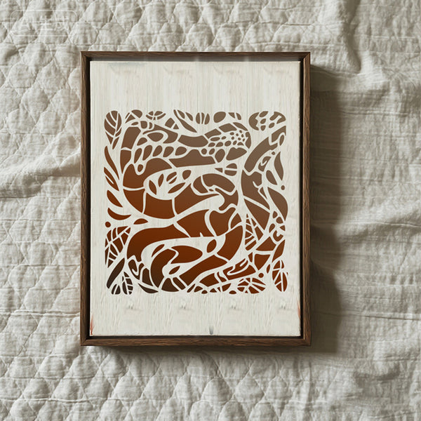 Framed artwork with a brown abstract design on a beige background