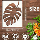 Leaf-shaped stencil with dimensions on a wooden background