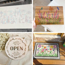 Collage of decorative items with floral designs and text on a wooden surface.