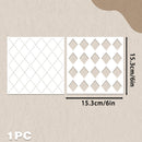 A product diagram showing a white square stencil or template with two diamond cutout patterns, labeled 15.3cm/6in on a beige textured background.