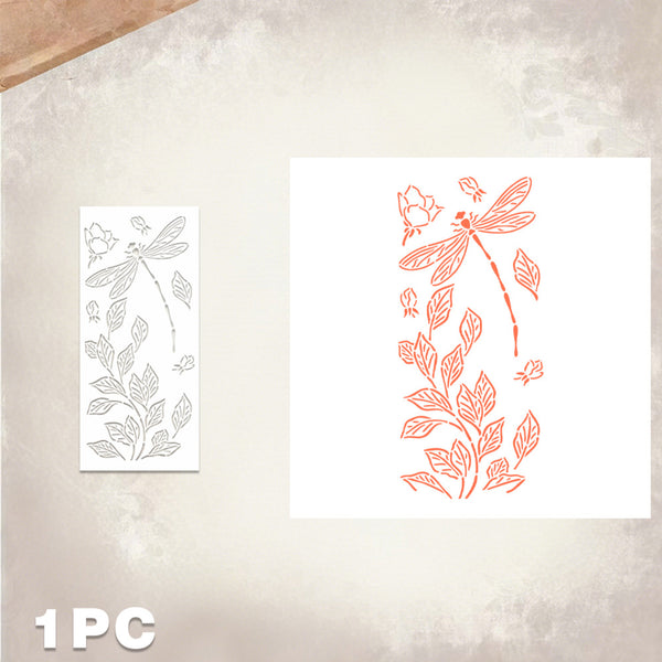 A single sheet of temporary tattoo stickers featuring a dragonfly and leafy vine design, shown both as a gray outline of the stencil/template and as a coral-orange printed sample on a textured beige background.