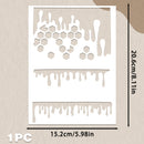 A white rectangular stencil sheet with three dripping and hexagon cutout patterns, shown on a beige textured background with printed dimensions 15.2cm by 20.