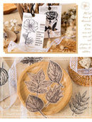 A collage showing a clear stamp set with botanical illustrations, including flowers, a rose, and leaves. The top panel shows the stamps and tags arranged on a rustic surface with dried flowers and lace.
