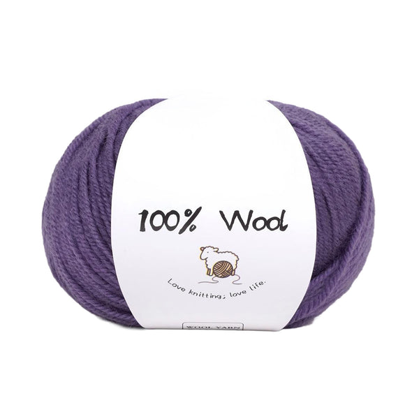 A ball of purple 100% wool yarn wrapped with a white paper label that reads '100% Wool' and features a small sheep illustration, set against a plain white background.