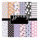 A collage of 12 Halloween-themed patterned swatches with pumpkins, ghosts, spiders, candy corn, stars, and chevron designs in pastel and black colors, overlaid with the word 'Spooky' in white script on a black rectangle.