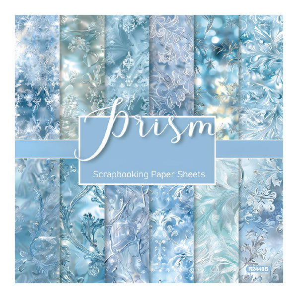 A pack of Prism scrapbooking paper sheets featuring a winter theme with light blue, icy blue, and white patterns of snowflakes, frost, and delicate floral designs.