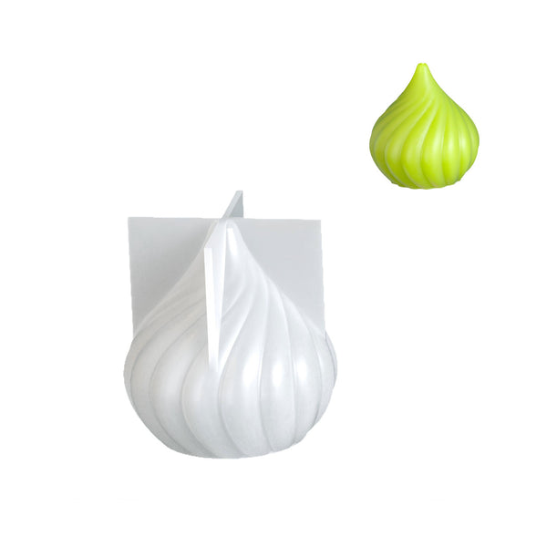 A white silicone mold shaped like a garlic bulb with a pointed top, shown alongside a small lime-green garlic-shaped object in the upper right on a plain white background.