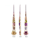 Three views of a clear glass nail file with dried flower inclusions, showing front, side, and back perspectives on a white background.