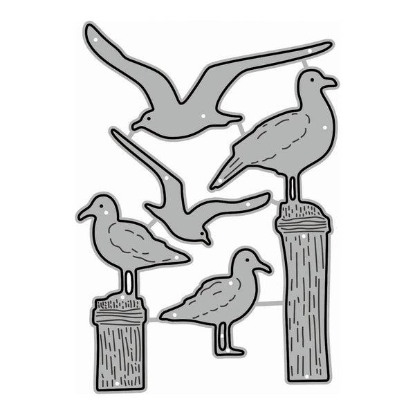 A set of gray seagull cutouts with black outlines, including flying and standing birds on wooden posts, shown on a plain white background.