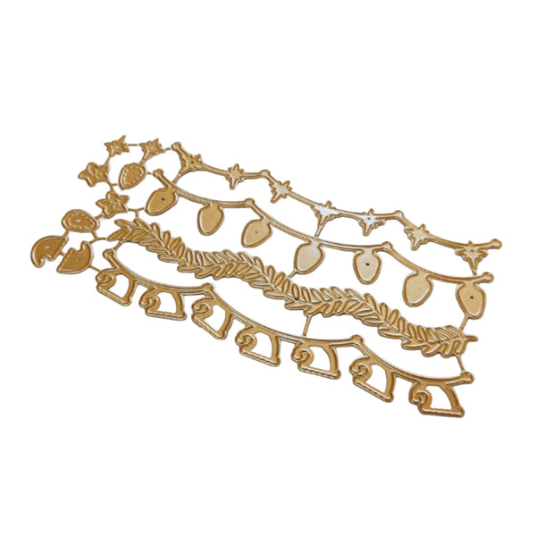 A gold-colored metal holiday wreath and garland die-cut template, featuring stars, acorns, leaves, and hanging ornaments, shown on a plain white background.