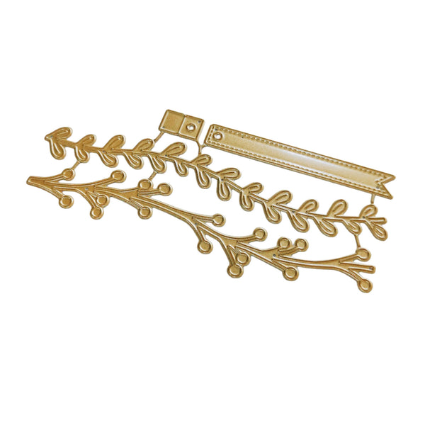 Gold metal decorative branch and leaf embellishment with a ribbon banner piece, shown on a plain white background.