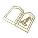Gold metal embosser or die-cutting frame set with decorative borders and a cursive script name reading 'Dana' on a plain white background.