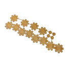 A gold-colored floral lace trim featuring repeating daisy-like flower motifs and small round beads, shown on a plain white background.
