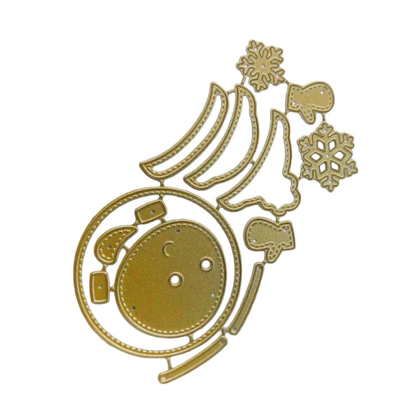 A gold-colored metal die-cut craft template featuring a stylized Christmas tree, snowflake, mitten, and ornaments, isolated on a white background.