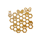 A gold-colored metal craft die featuring a honeycomb pattern with bee and butterfly motifs, shown on a plain white background.