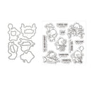 A clear stamp set sheet with cartoon duck illustrations, phrases like 'I Miss You', 'Big Love', and 'Thank You', shown next to six matching metal die-cut outlines on a white background.