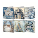 Six Christmas-themed diamond painting cards arranged in a 2x3 grid on a white background. The cards feature festive designs including a polar bear, wrapped gifts, ornaments, Santa Claus, a Christmas tree, and a snowman.