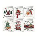 Six Christmas greeting cards arranged in two rows on a white background. The cards feature festive illustrations including Christmas trees, a snowman in a red hat, Santa Claus, a decorated tree with a reindeer, a red truck carrying gifts, and holiday text such as 'Merry Christmas,' 'Let it snow,' 'Oh My Dear,' and 'The most wonderful time of the year.