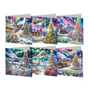 Six Christmas-themed diamond painting canvases displayed in two rows against a white background, each featuring vibrant, colorful winter scenes with decorated trees, snow, lights, and festive landscapes.