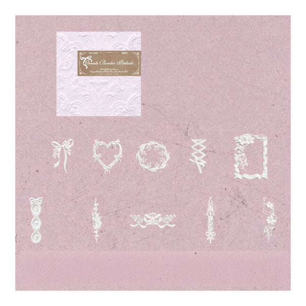 A sheet of white decorative embossed paper with various white lace-like and floral border designs, presented on a dusty pink background with a brand label at the top.