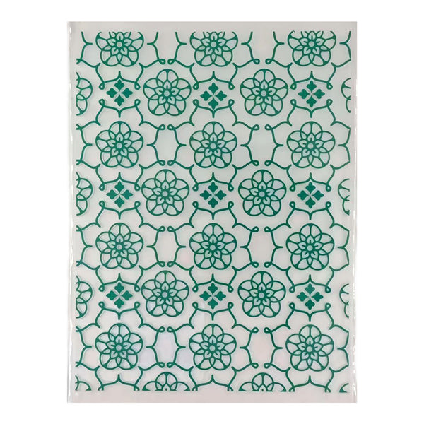 Rug with green floral pattern on a white background