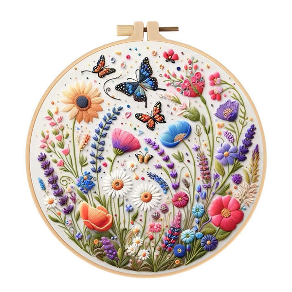 Embroidery hoop with colorful floral and butterfly design on a white background