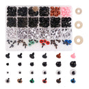 A plastic organizer tray filled with assorted small hardware and eye-like accessory pieces in many colors, shown on a white background with matching loose pieces arranged below and to the right.