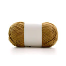 Ball of brown yarn with a white label on a white background