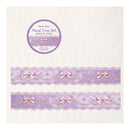 A product display of a lavender and pink floral trim set, featuring two horizontal strips of decorative lace trim with bows and a circular product label at the top left on a textured off-white background.