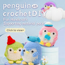 Crocheted penguin toys with colorful hats on a light blue background