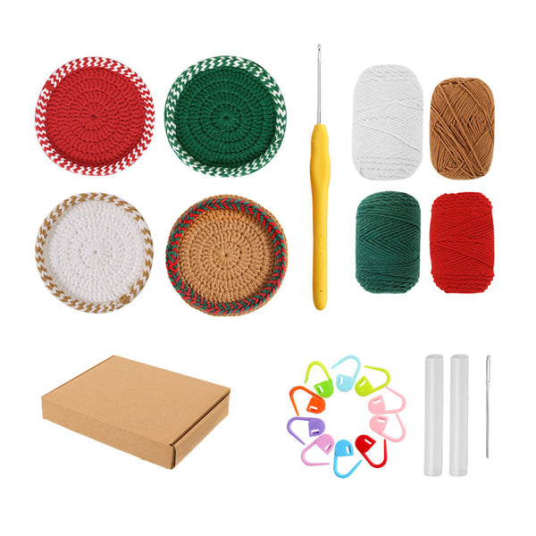 A crochet kit laid out on a white background, including six crocheted or knitted circular samples in red, green, white, and tan, a yellow crochet hook, two balls of white yarn, two balls of brown yarn, two balls of dark green yarn, two balls of red yarn, a small cardboard box, a ring of colorful stitch markers, two clear tape measures, and a white needle.