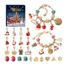 Christmas-themed charm beads and charms set with a blue gift box, featuring gold-tone chains, red and green enamel accents, Santa Claus, snowman, bell, stocking, gift, snowflake, crown, and heart charms.
