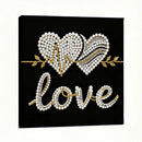 Decorative wall art with heart design and 'love' text on a black background