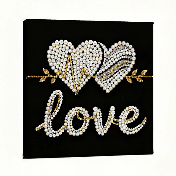 Decorative wall art with heart design and 'love' text on a black background