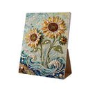 Decorative card with sunflowers and pearl embellishments on a white background