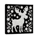A square black canvas wall art print featuring a white reindeer and snowflakes made of sparkling gem-like patterns, shown at a slight angle on a white background.