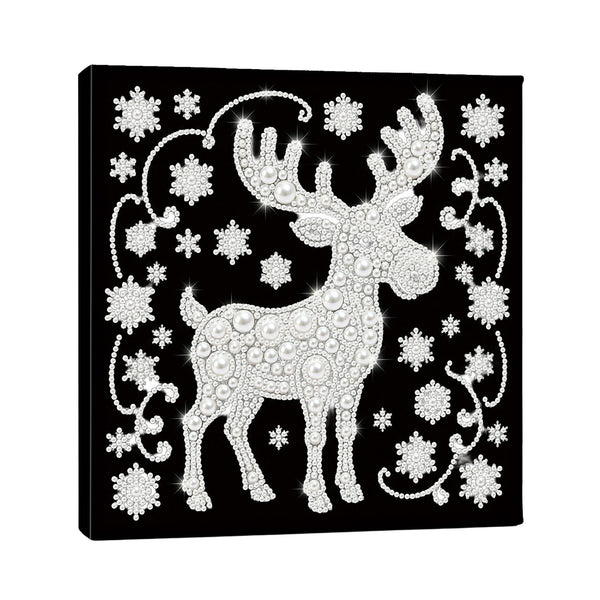 A square black canvas wall art print featuring a white reindeer and snowflakes made of sparkling gem-like patterns, shown at a slight angle on a white background.