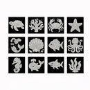 A set of twelve square black tiles, each decorated with a white sea life illustration made of sparkling rhinestones. The illustrations include a turtle, coral, crab, starfish, seahorse, scallop shell, fish, octopus, shark, and kelp.