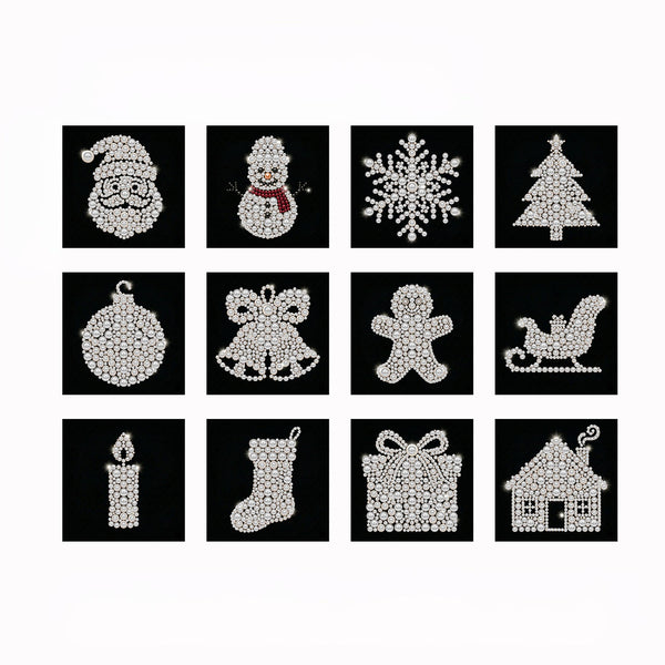 A 3x3 grid of holiday-themed rhinestone designs on black square backgrounds, including Santa Claus, a snowman, a snowflake, a Christmas tree, a ornament, a bell, a gingerbread person, a sleigh, a candle, a stocking, a gift box, and a house.