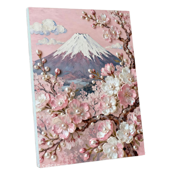 A 3D canvas art print featuring a Japanese landscape with Mount Fuji, pink cherry blossoms, and pearl-like flowers on branches, shown at an angle against a white background.