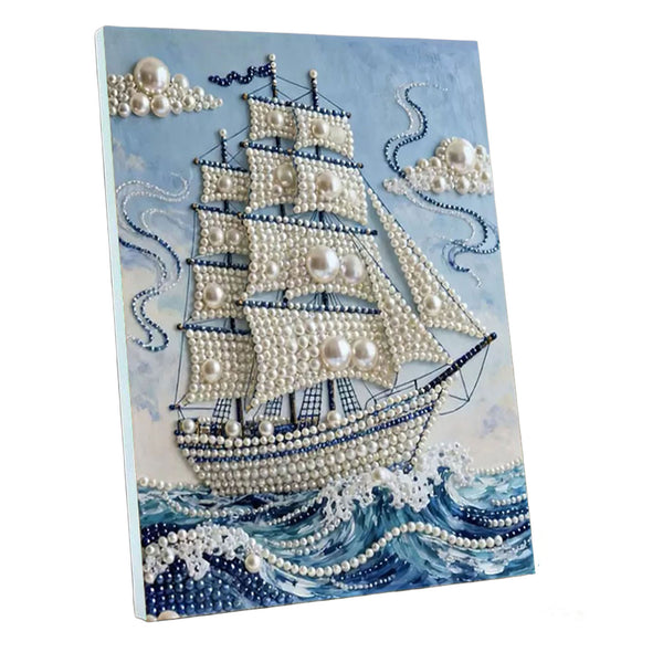 A 3D pearl bead wall art piece depicting a sailing ship on blue ocean waves, shown at an angle against a white background.