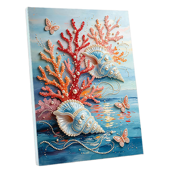 A square canvas wall art print featuring an underwater coral and shell scene, with red, orange, pink, and blue tones, pearl-like bead details, and butterflies, shown against a plain white background.