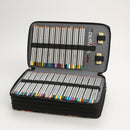 Set of colored pencils in an open case on a white background