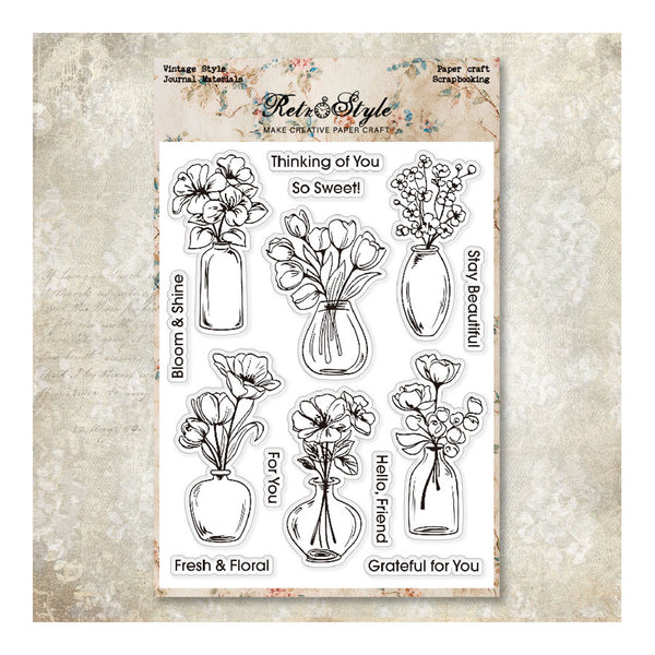 A sheet of floral stamp designs from Flea & Style Paper Craft Stamp Tea, featuring black line-art illustrations of flowers in vases with phrases like 'Thinking of You So Sweet!' and 'Fresh & Floral', displayed on a textured beige background.