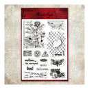 A sheet of clear stamp designs with spooky Halloween-themed phrases and illustrations, including 'boo!', 'Halloween', 'ghost', 'moth', and 'foreign science', presented on a textured beige background.